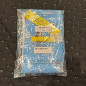 Gingerbread skiing pajamas